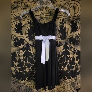 Girls black dress with white waist ribbon size 10/12